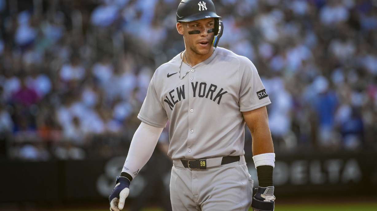 New York Yankees' Aaron Judge leaves the field after not scoring in the eighth inning of a baseball game against the New York Mets, Saturday, July 5, 2025, in New York.