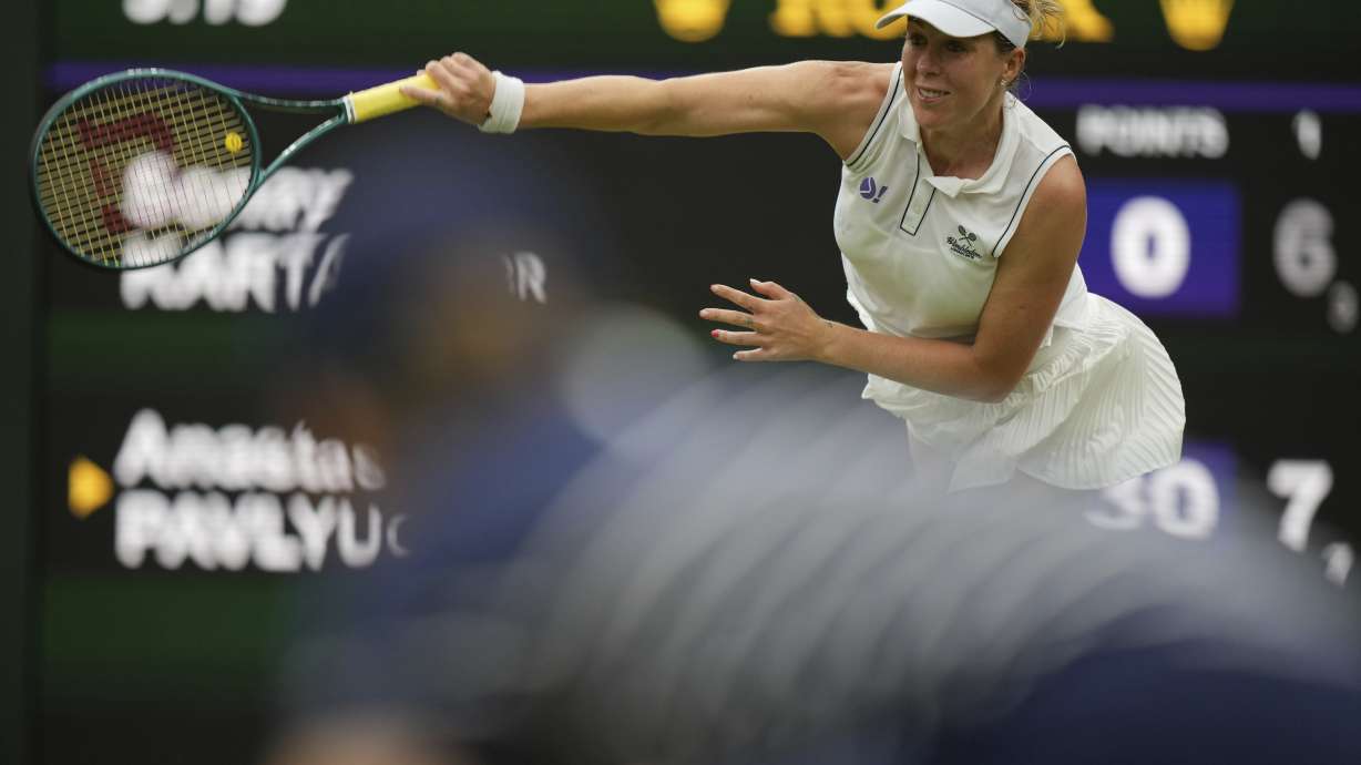 Russia's Anastasia Pavlyuchenkova serves to Sonay Kartal of Britain during a fourth round women's singles match at the Wimbledon Tennis Championships in London, Sunday, July 6, 2025.