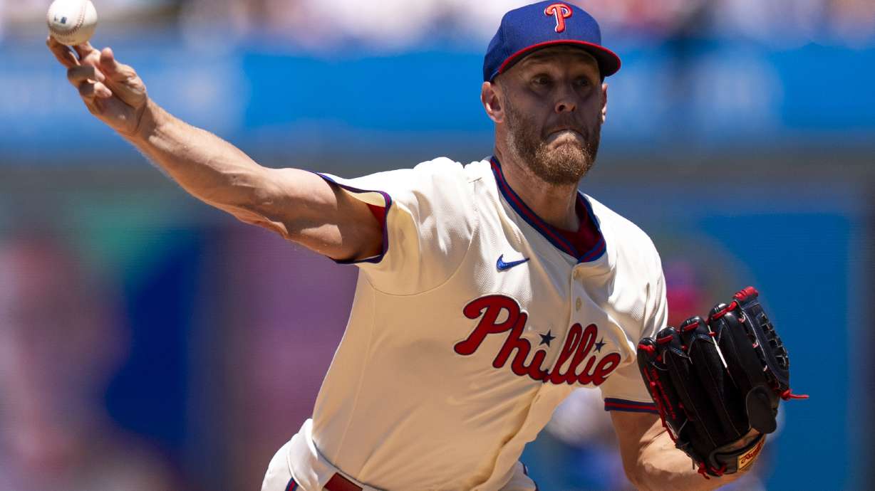 Philadelphia Phillies starting pitcher Zack Wheeler delivers during the first inning of a baseball game against the Cincinnati Reds, Sunday, July 6, 2025, in Philadelphia.