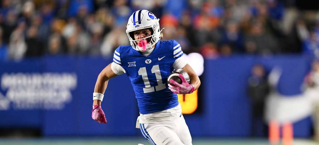 Brigham Young wide receiver Parker Kingston (11) rounds the edge on an end around as BYU and Oklahoma State play in Provo at LaVell Edwards Stadium on Friday Oct. 18, 2024.