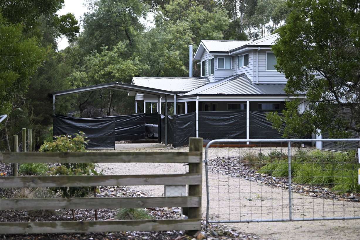 Black plastic surrounds the exterior of the Leongatha home on July 1, where Erin Patterson allegedly served up a meal with death cap mushrooms in July 2023, in Leongatha, Australia. Patterson was convicted of triple murder on Monday.
