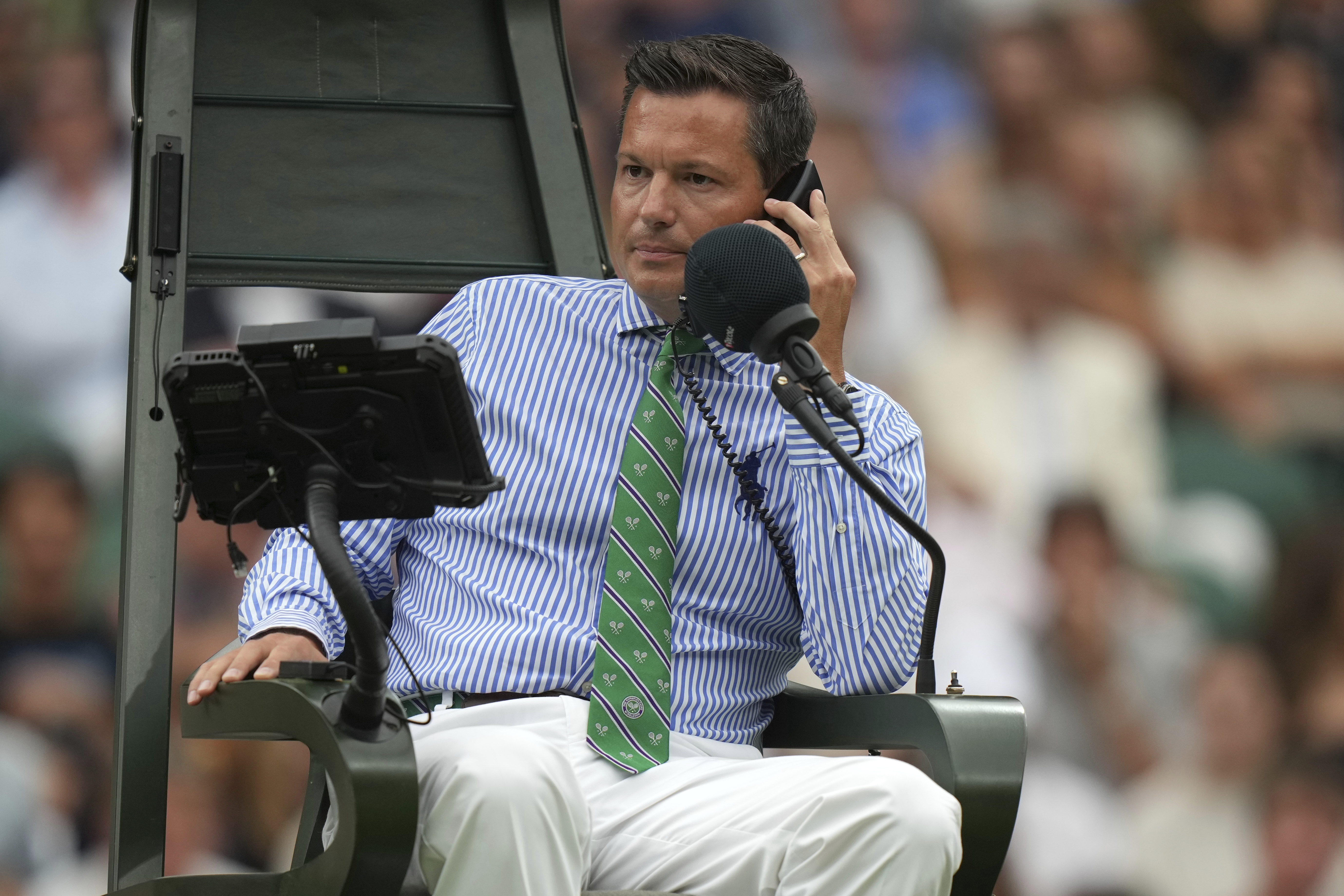 Wimbledon blames human error for a mistake by the tech that replaced officials. Here's what happened