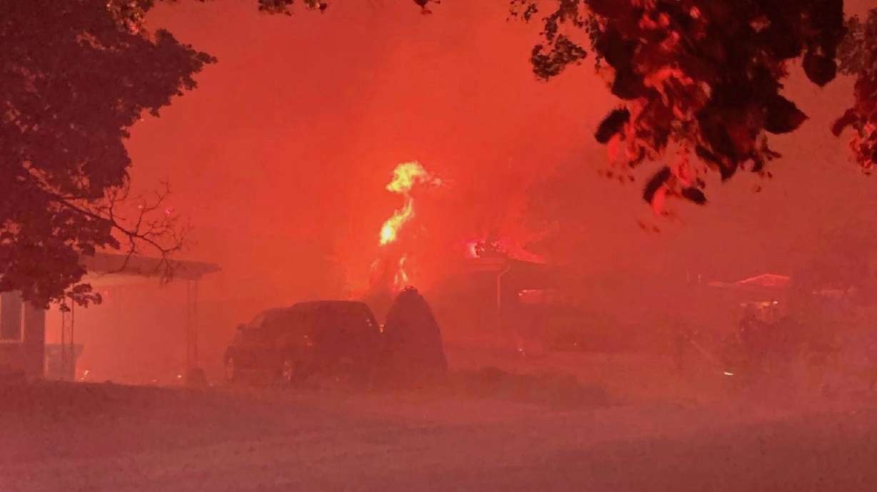 A fire started by fireworks on Sunday in Ogden severely damaged a home and prompted the temporary evacuation of seven or eight homes.