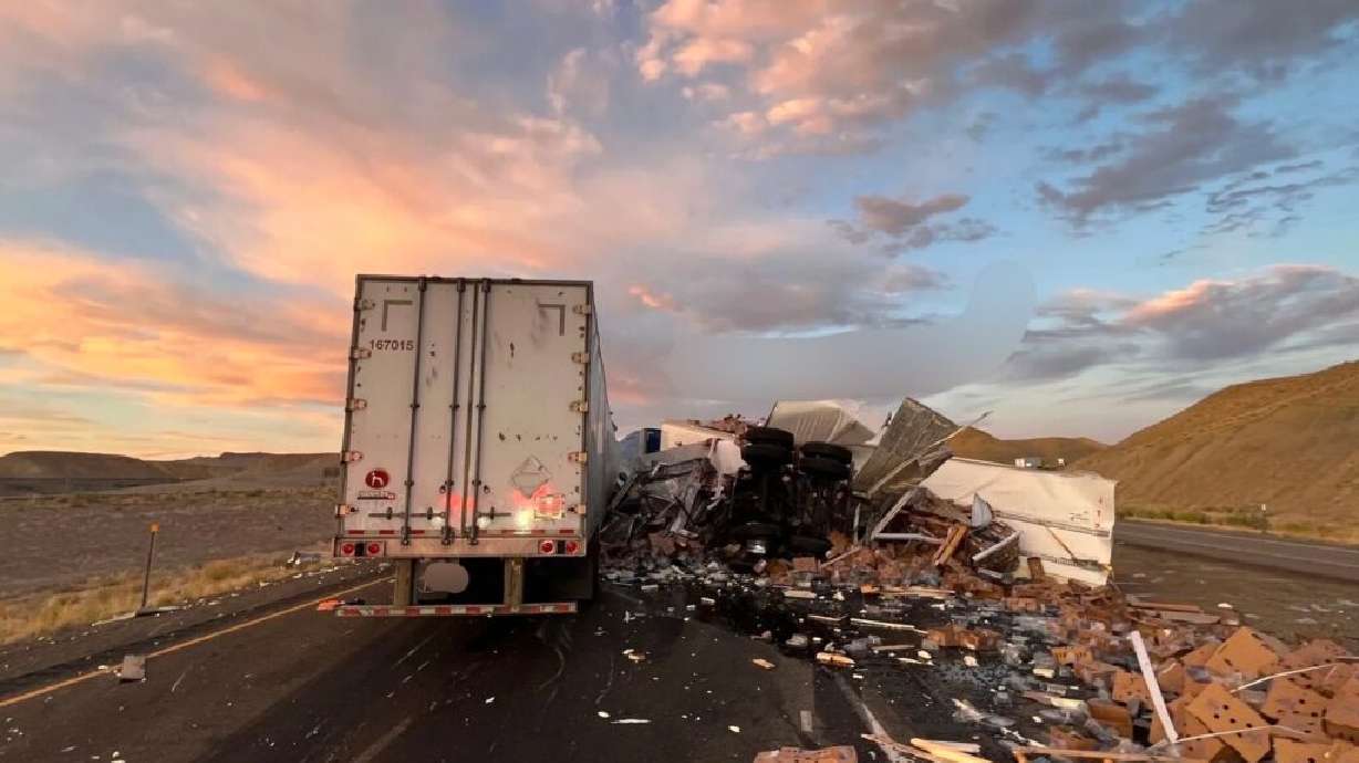 Wreckage of a fatal crash on eastbound I-70 is seen near Crescent Junction, Grand County on Sunday.