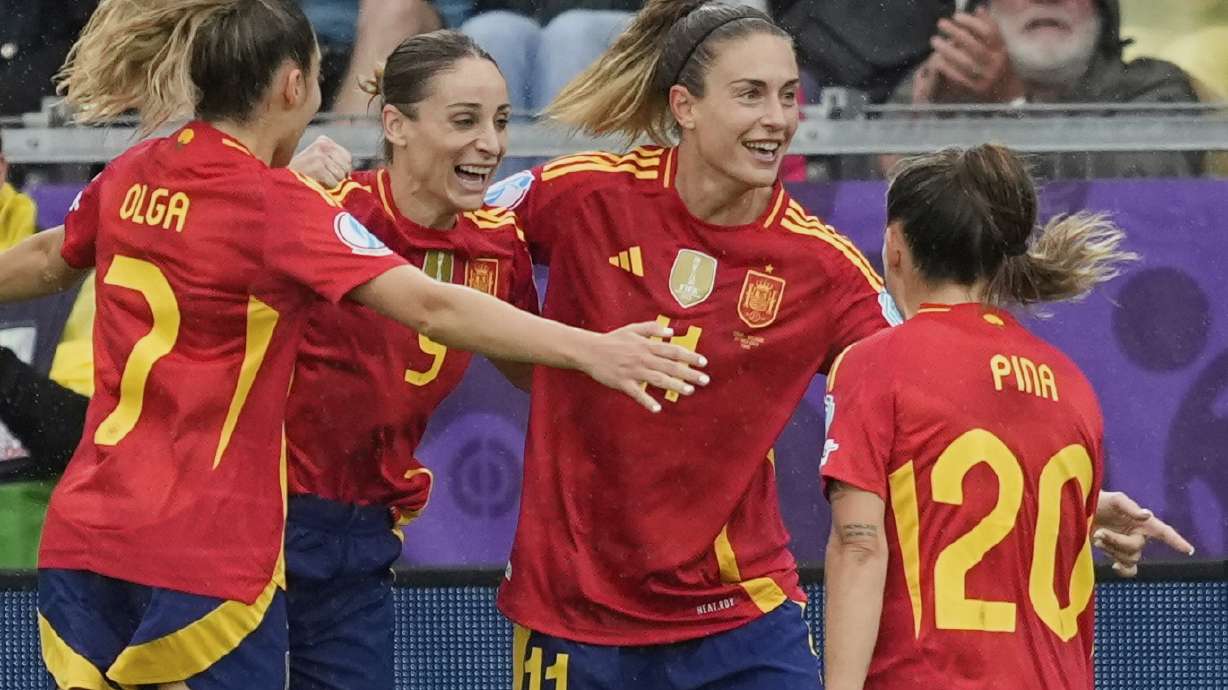 Spain's Alexia Putellas (11) celebrates after scoring her side's opening goal during the Euro 2025, group B, soccer match between Spain and Belgium at Arena Thun in Thun, Switzerland, Monday, July 7, 2025.