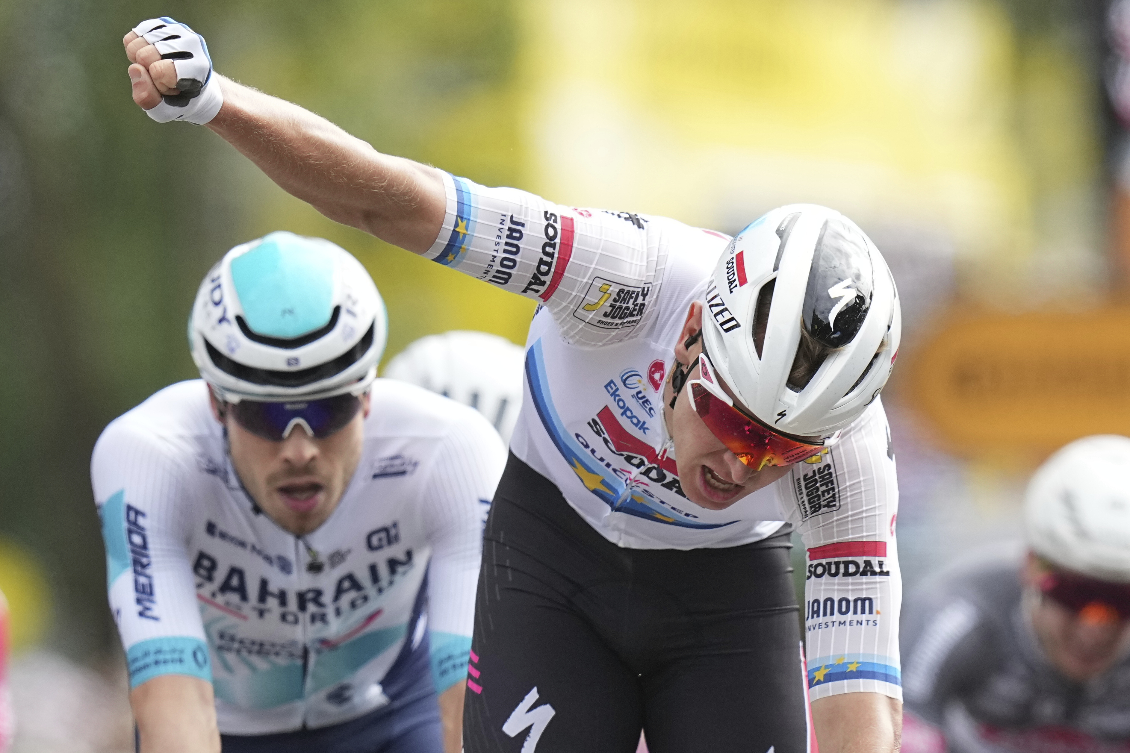 Belgium's Tim Merlier celebrates as he crosses the finish line to win the third stage of the Tour de France cycling race over 178.3 kilometers (110.8 miles) with start in Valenciennes and finish in Dunkerque, France, Monday, July 7, 2025.