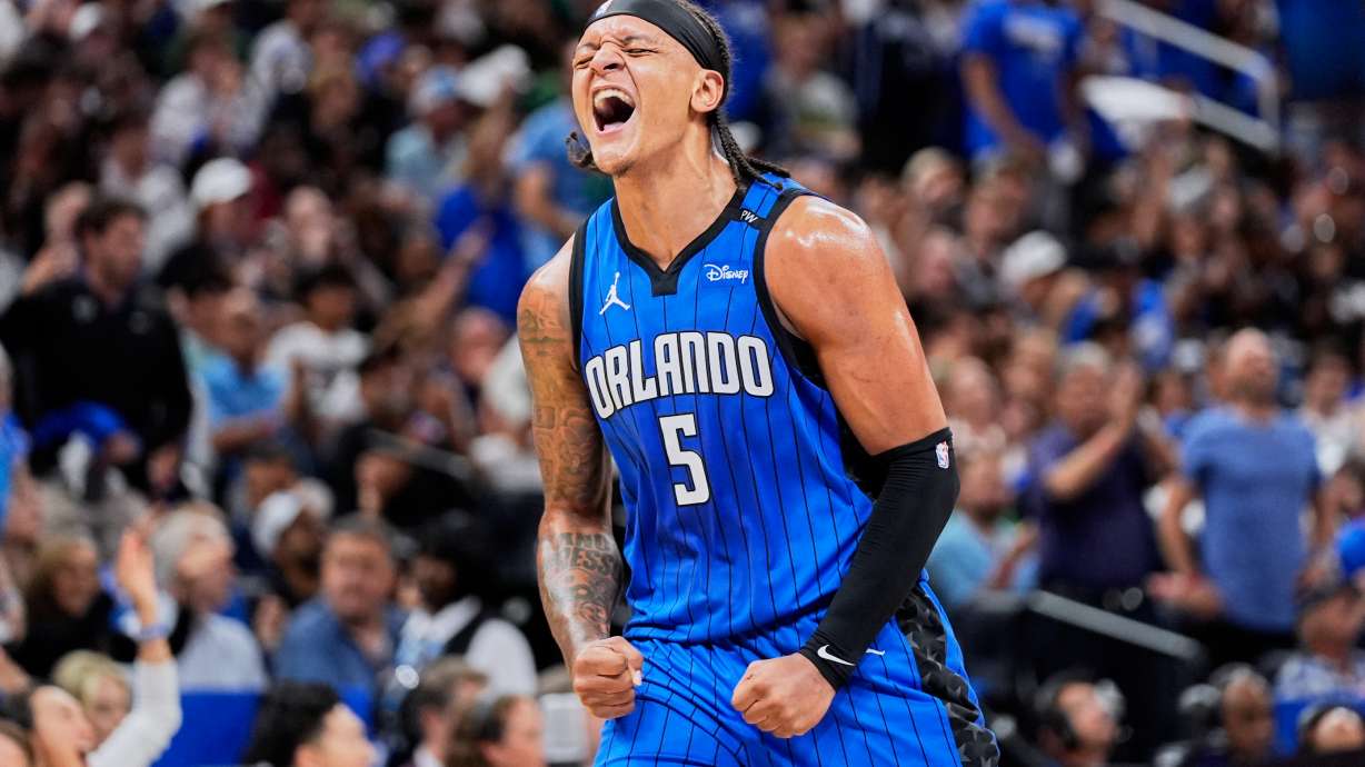 FILE - Orlando Magic forward Paolo Banchero celebrates a 3-point shot against the Boston Celtics during the first half in game 3 of a first-round NBA playoff basketball series, April 25, 2025, in Orlando, Fla.
