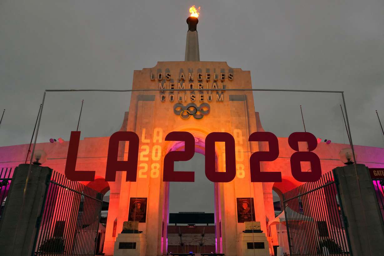 An LA 2028 sign is seen in front of the Olympic cauldron at the Los Angeles Memorial Coliseum on Sept. 13, 2017.
