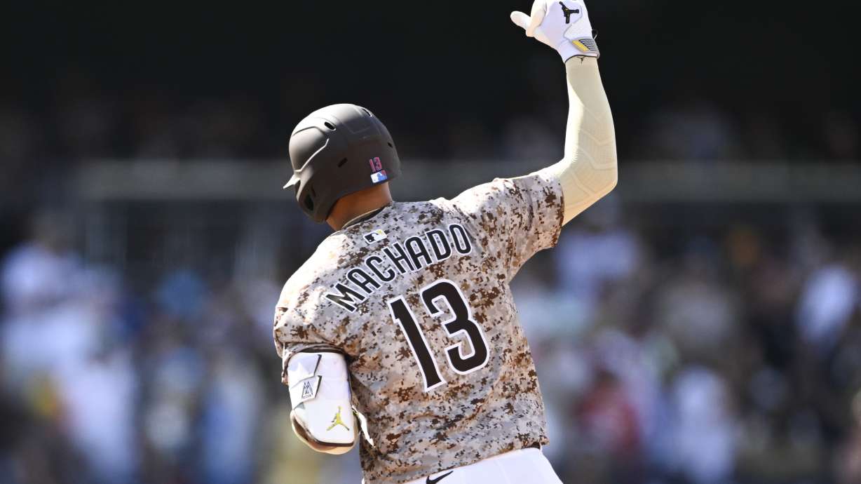 San Diego Padres' Manny Machado rounds the bases after hitting a solo home run during the fourth inning of a baseball game against the Texas Rangers, Friday, July 4, 2025.