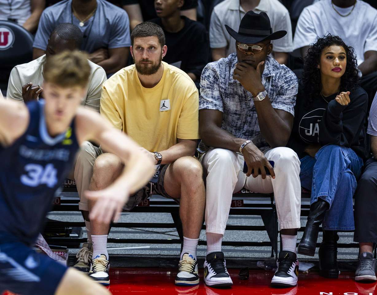 Utah Jazz players Svi Mykhailiuk, left, and Oscar Tshiebwe, right, both watch from the sidelines during an NBA Salt Lake City Summer League game between the Utah Jazz and the Memphis Grizzlies at the Jon M. Huntsman Center on the campus of the University of Utah in Salt Lake City on Monday, July 7, 2025.