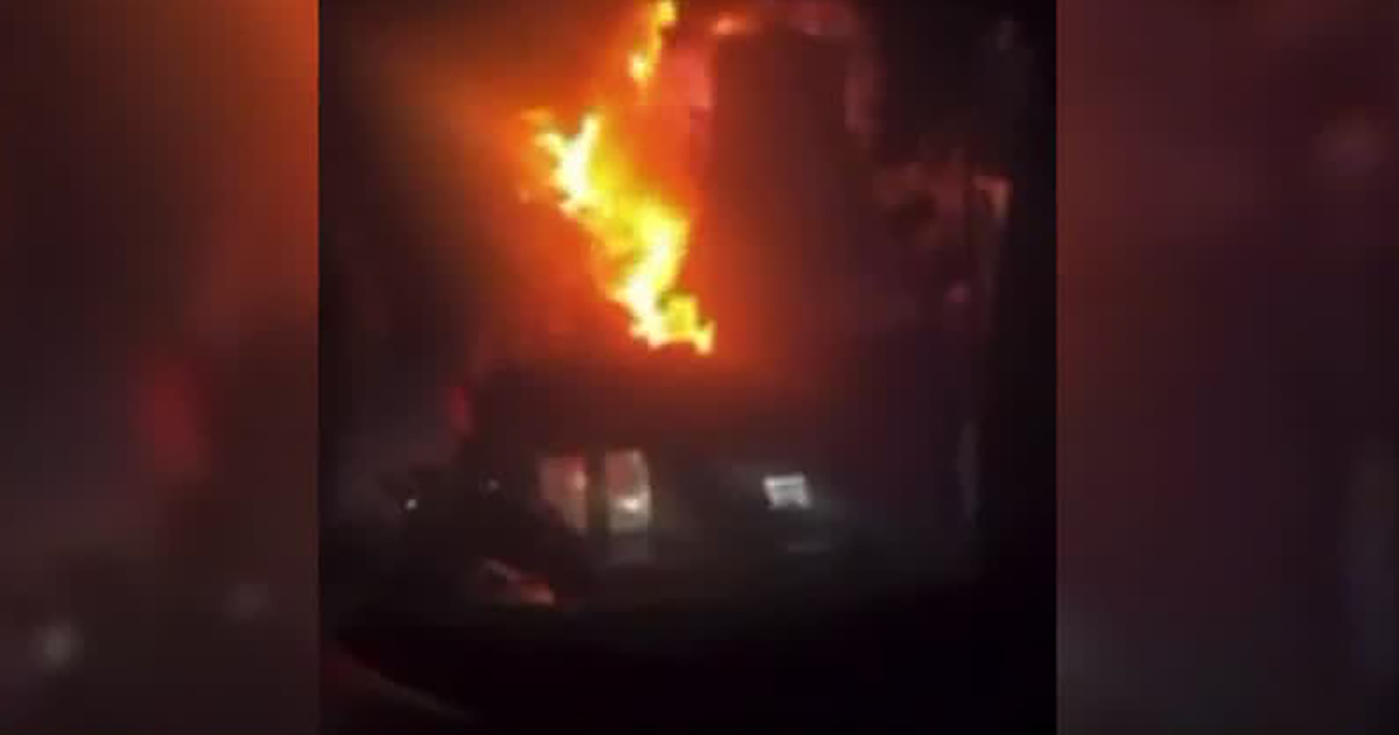 New video shows fiery Herriman crash: SUV runs red light, slams into building