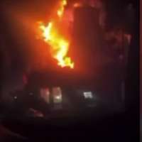 New video shows fiery Herriman crash: SUV runs red light, slams into building