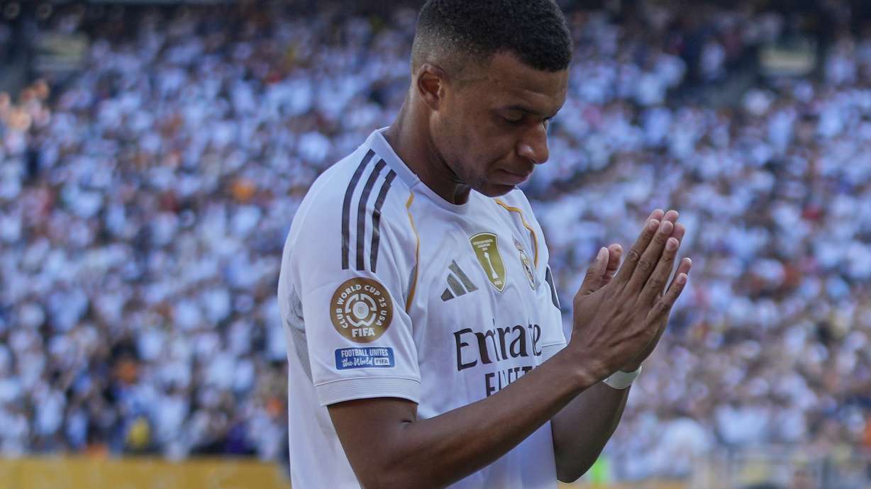 Real Madrid's Kylian Mbappe reacts after scoring a goal against Borussia Dortmund in extra time of a Club World Cup quarterfinal soccer match, Saturday, July 5, 2025 in East Rutherford, N.J.