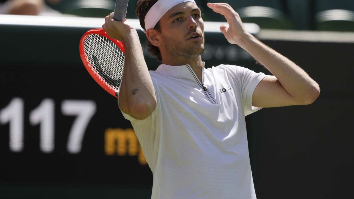 Taylor Fritz of the U.S. reacts during the men's singles quarter final match against Karen Khachanov of Russia at the Wimbledon Tennis Championships in London, Tuesday, July 8, 2025.