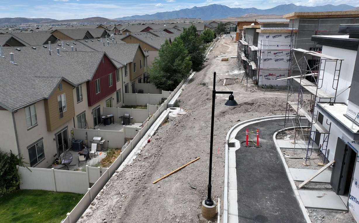 A view of construction at a commercial development near Crossroads Boulevard and Riverside Drive in Saratoga Springs on Thursday. Multiple drive-thrus are being built next to the housing, causing concern among neighboring residents.