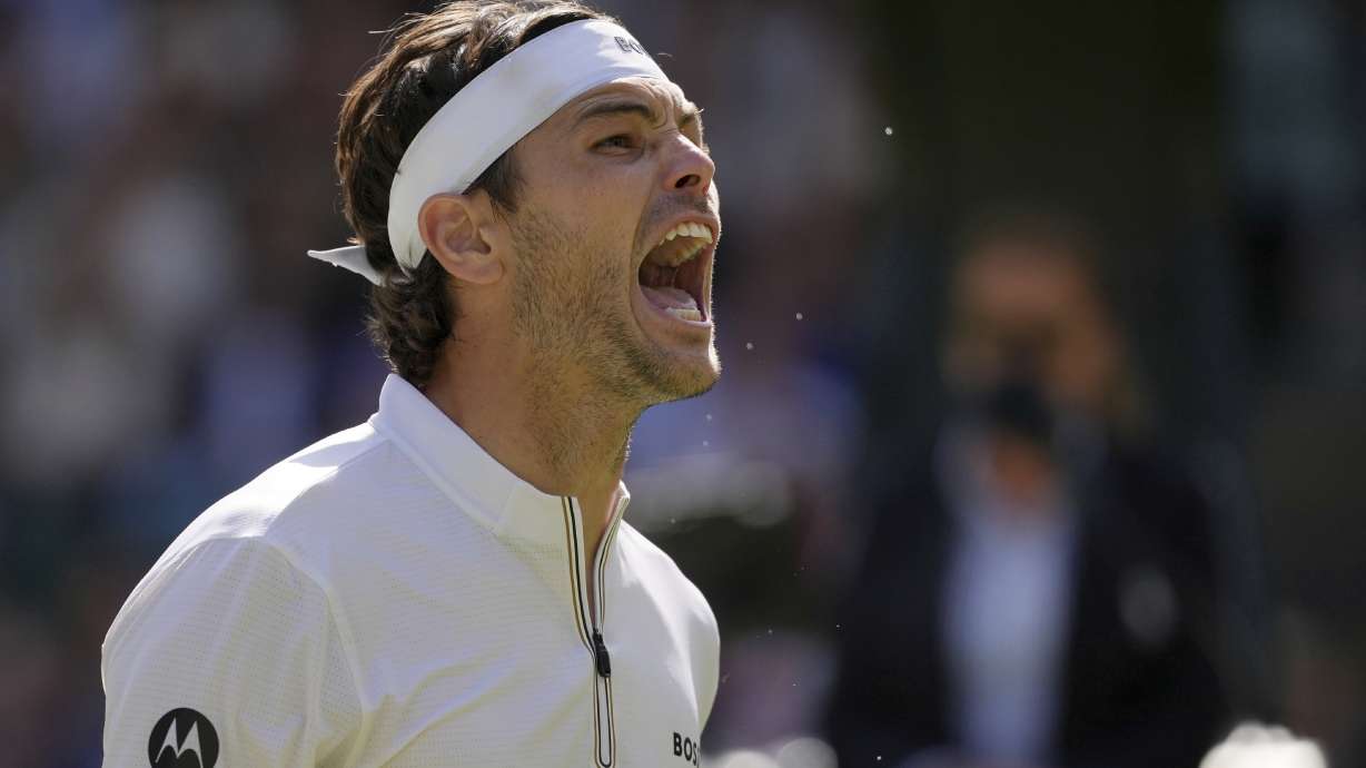 Taylor Fritz of the U.S. celebrates winning the men's singles quarter final match against Karen Khachanov of Russia at the Wimbledon Tennis Championships in London, Tuesday, July 8, 2025.