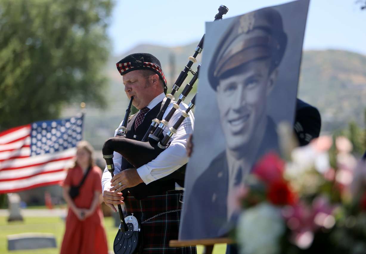 A bagpiper plays at the interment for 1st Lt. George Wilson at Bountiful City Cemetery on Tuesday. Wilson's remains arrived in Utah only a few days ago.