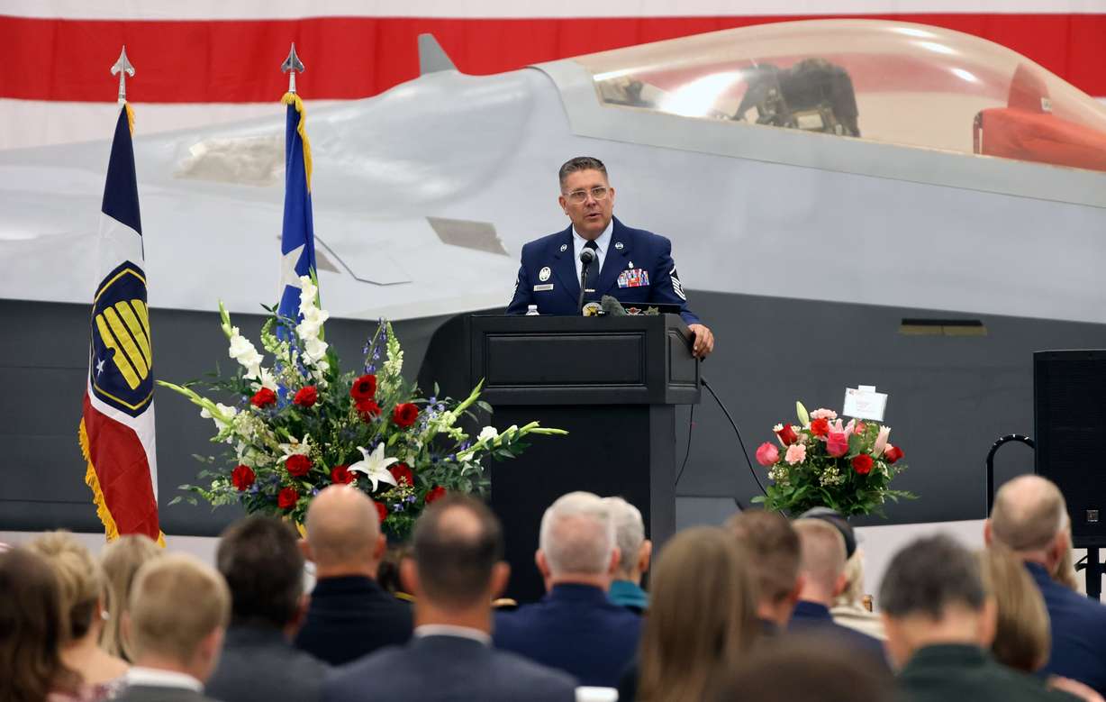Master Sgt. Erik Bornemeier speaks at the memorial service for 1st Lt. George Wilson at the Hill Aerospace Museum on Tuesday. Bornemeier said Wilson displayed "conspicuous gallantry and intrepidity."