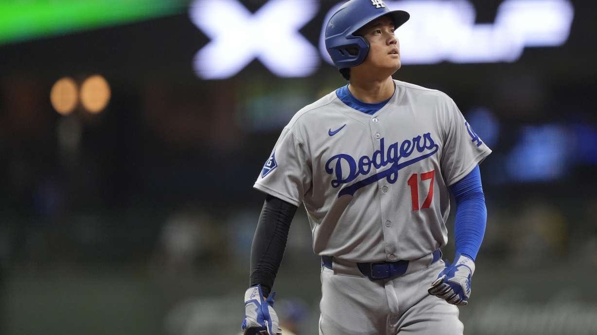 Los Angeles Dodgers' Shohei Ohtani looks on during the eighth inning of a baseball game against the Milwaukee Brewers, Monday, July 7, 2025, in Milwaukee.