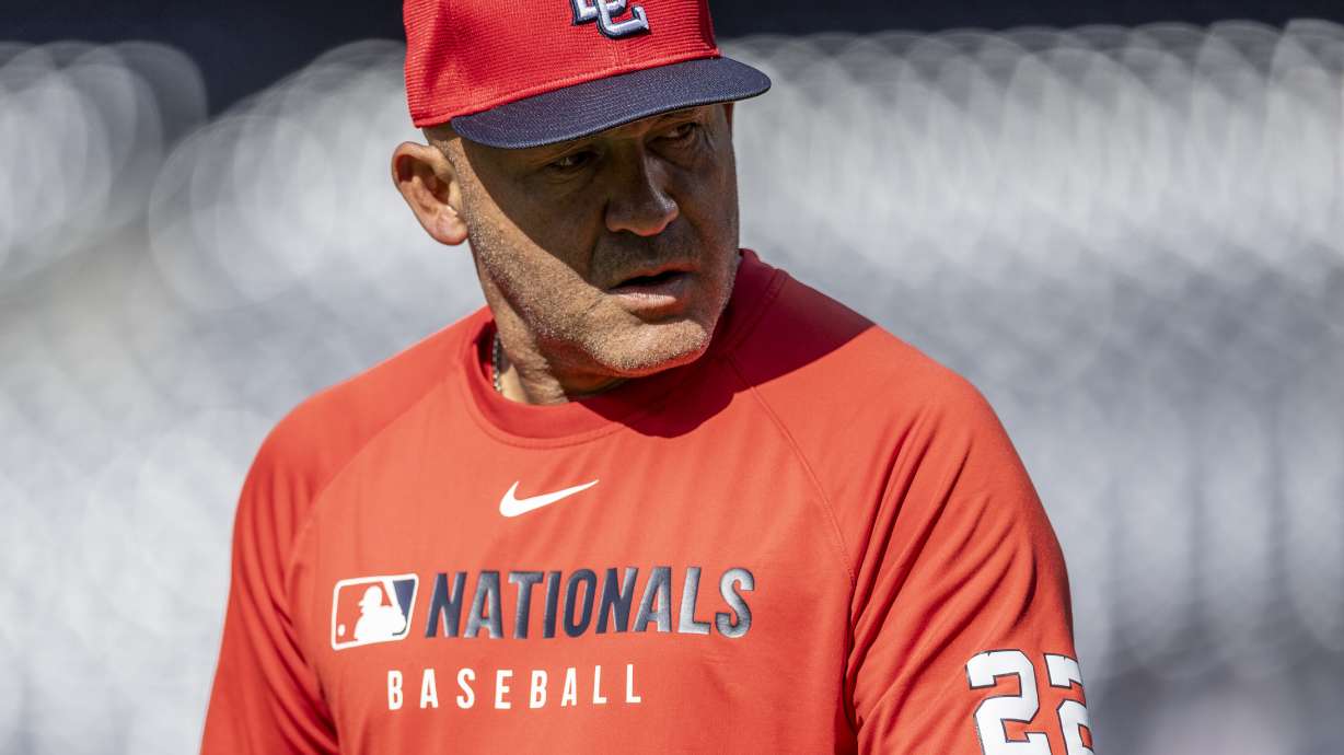 FILE - Washington Nationals bench coach Miguel Cairo looks on during batting practice before a baseball game against the San Diego Padres, June 23, 2025, in San Diego.