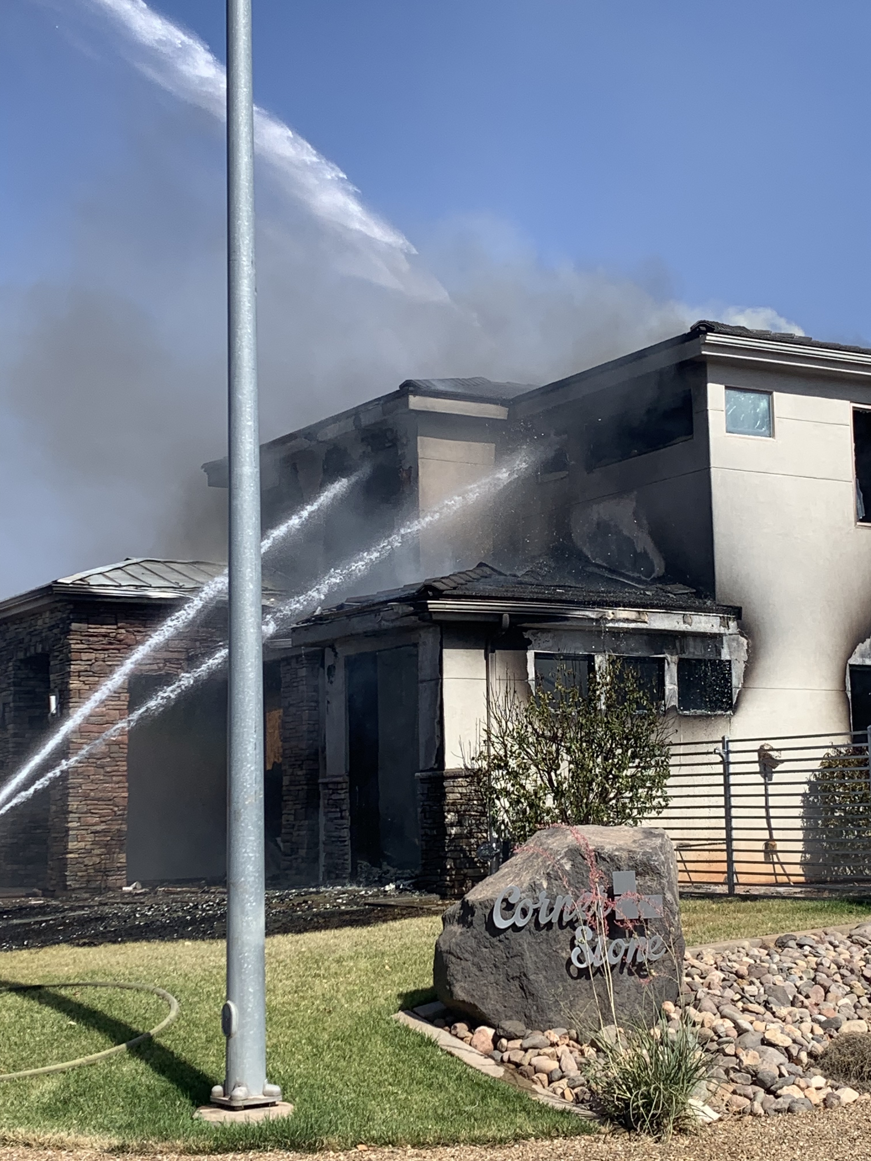A dangerous standoff in St. George on Tuesday ended when the suspected gunman's home became engulfed in flames. Police say he fired 150 rounds at officers.