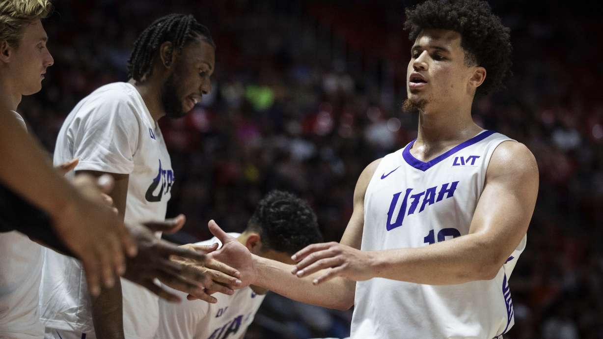 Utah Jazz guard Walter Clayton Jr. (13) high-fives teammates during an NBA Salt Lake City Summer League game between the Utah Jazz and the Memphis Grizzlies at the Jon M. Huntsman Center on the campus of the University of Utah in Salt Lake City on Monday, July 7, 2025.