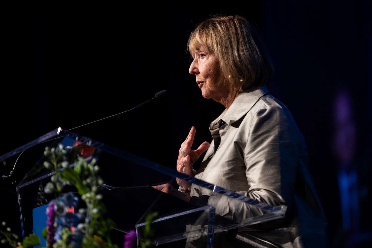 Kathi Garff, board chair of the Ken Garff Automotive Group, speaks during the Show Up For Teachers – Honors in Education Awards Gala held at the Grand America Hotel in Salt Lake City on Tuesday.