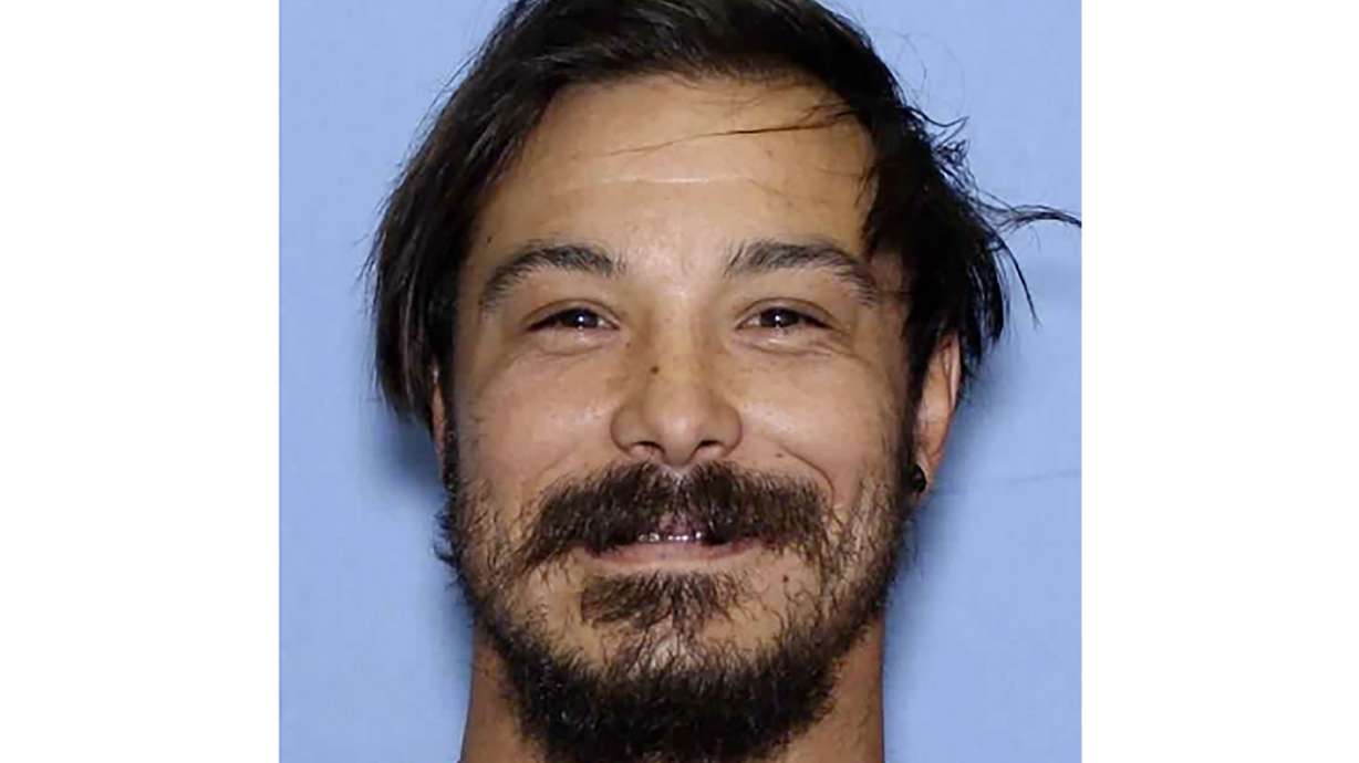Travis Caleb Decker, who is wanted in connection with the deaths of his three daughters. Federal authorities in Idaho say they ended a search for Decker in the Sawtooth National Forest after finding a hiker who looked like him.