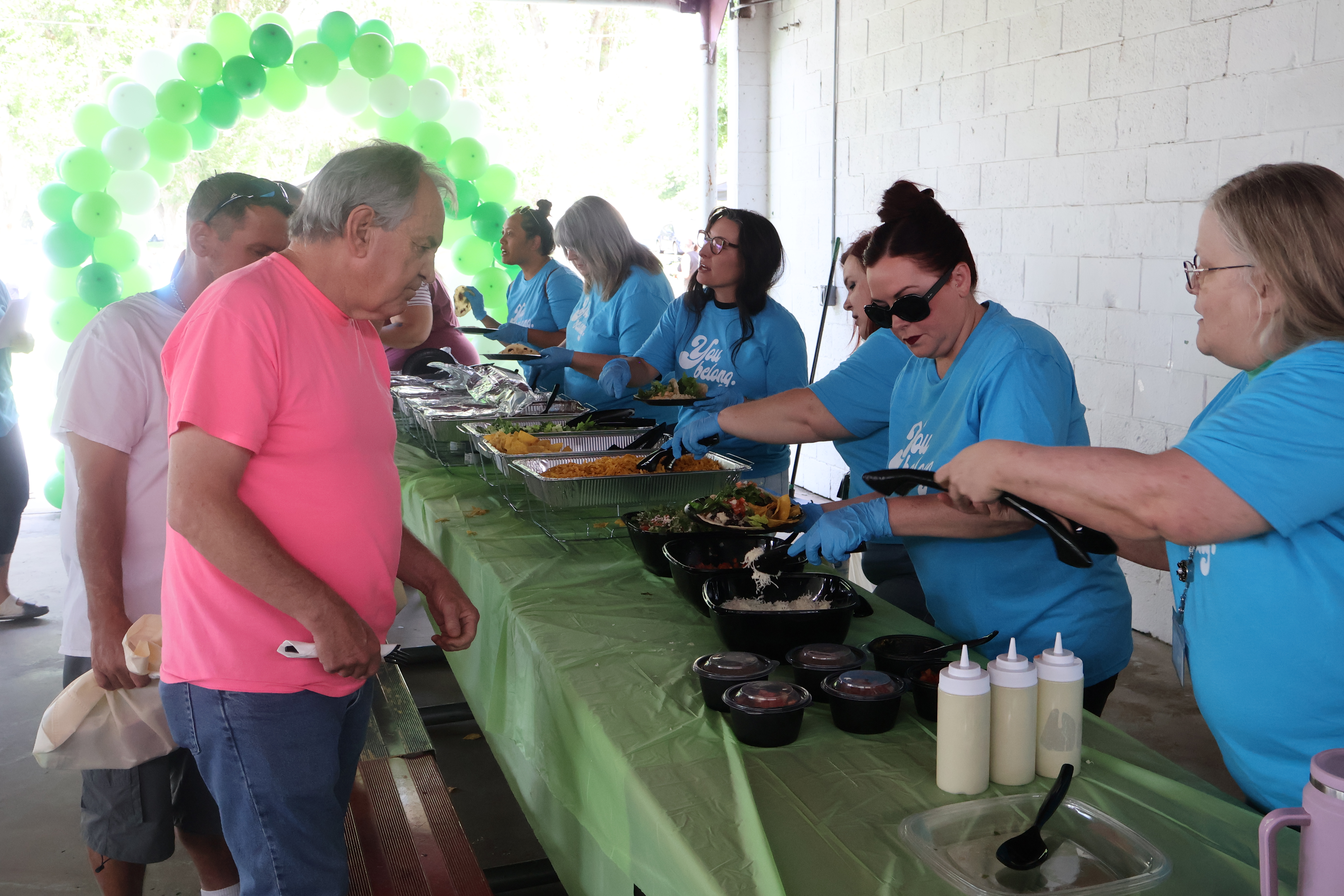 Valley Behavioral Health's Tooele recovery clients and their families are served lunch during the celebration for those in the recovery program, on June 24, at Tooele City Park.