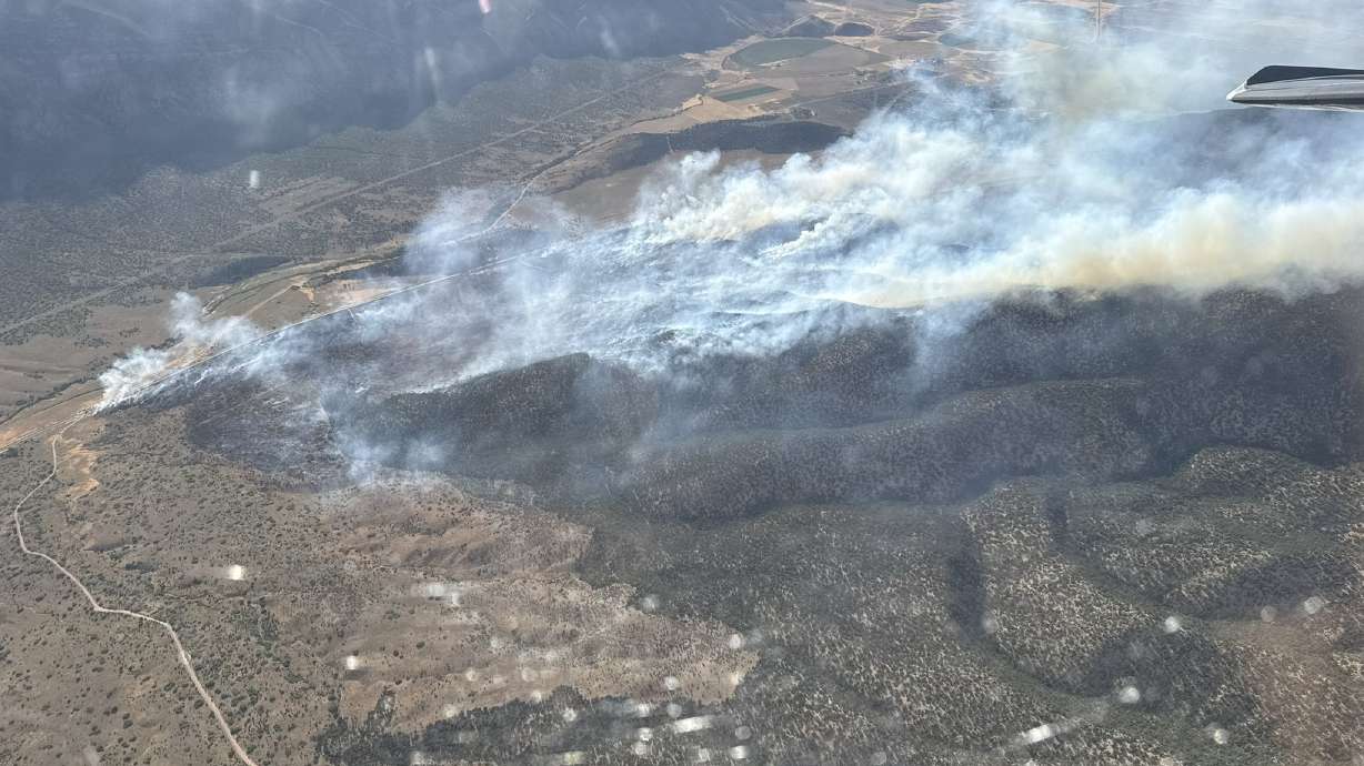 A wildfire north of Scipio Lake on Wednesday has now reached 300 acres, closing part of southbound U.S. 50 as fire crews fight the blaze.