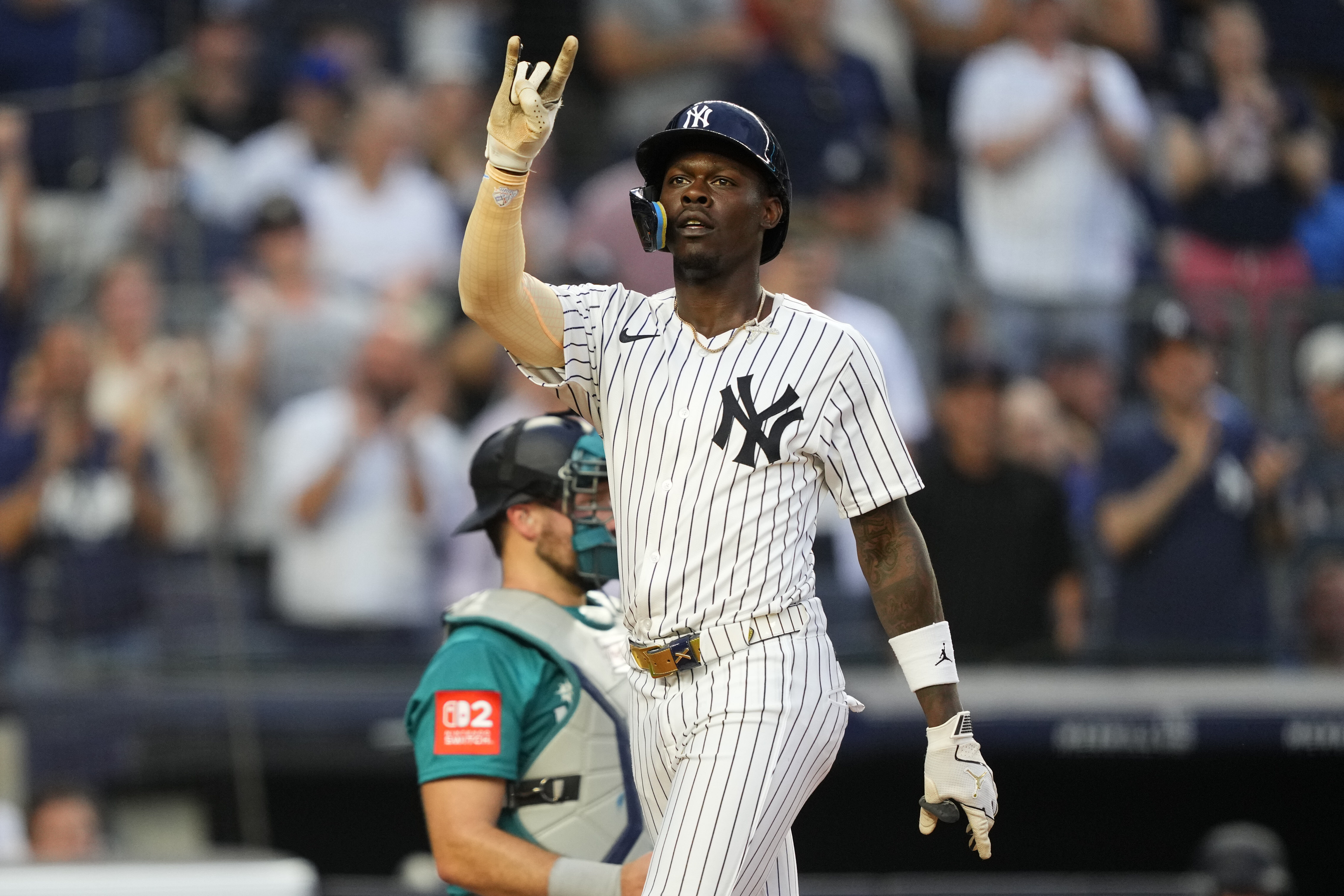 New York Yankees' Jazz Chisholm Jr. reacts after hitting a home run during the third inning of a baseball game against the Seattle Mariners, Wednesday, July 9, 2025, in New York.