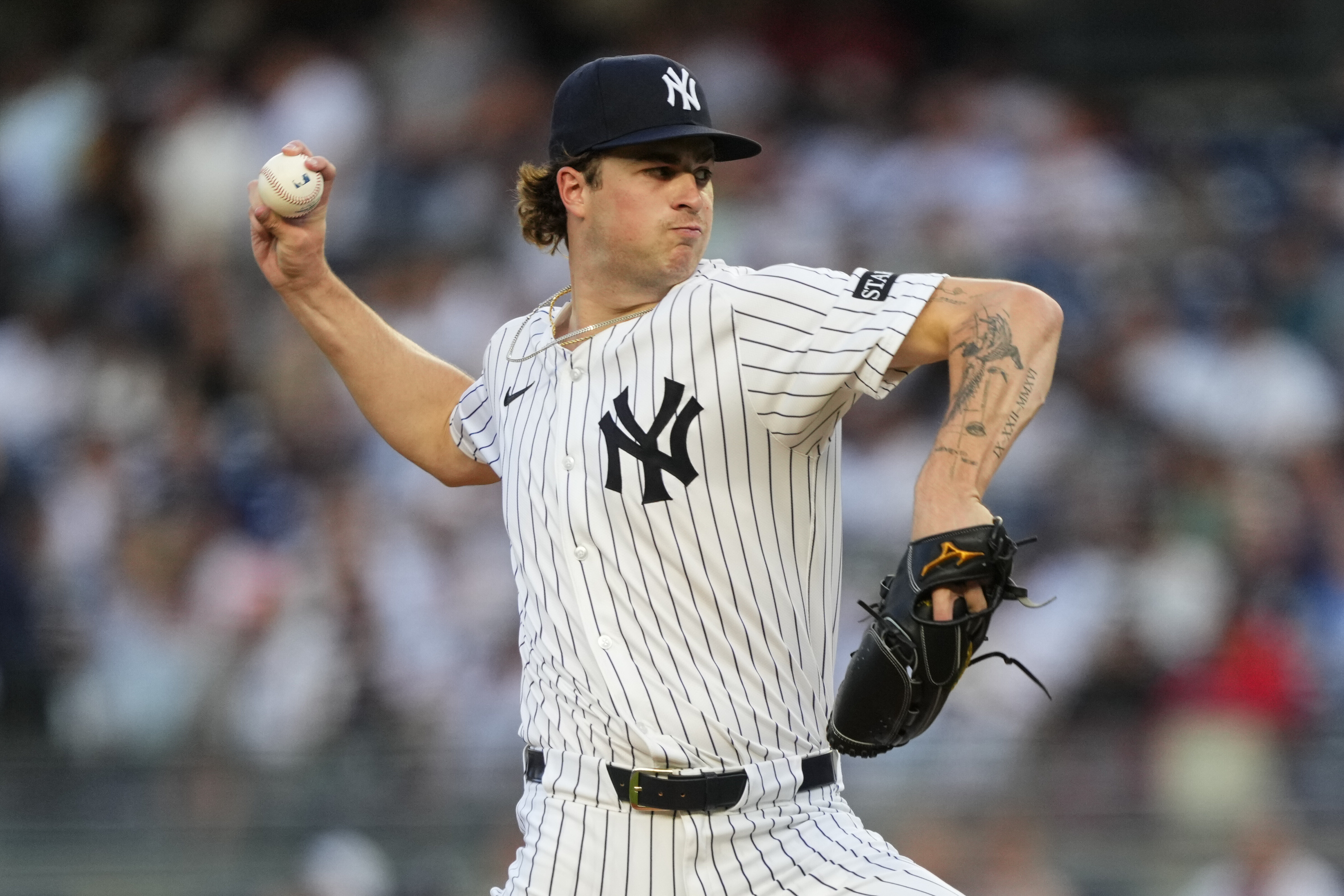 New York Yankees pitcher Cam Schlittler (31) throws during the first inning of a baseball game against the Seattle Mariners, Wednesday, July 9, 2025, in New York.