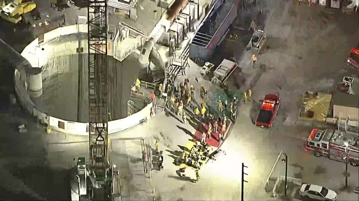 This image taken from footage provided by KABC/ABC7 Los Angeles shows first responders working the scene after a tunnel collapsed on Wednesday in Los Angeles.