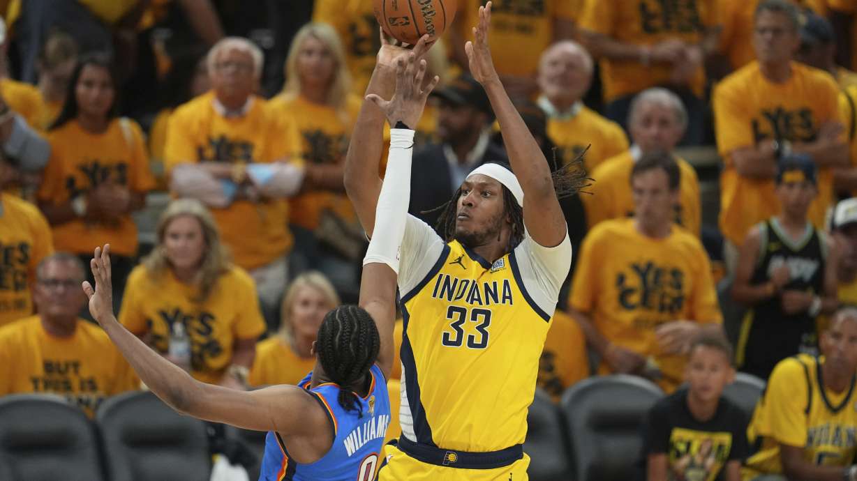 FILE - Indiana Pacers center Myles Turner (33) shoots over Oklahoma City Thunder forward Jalen Williams (8) during the second half of Game 6 of the NBA Finals basketball series, June 19, 2025, in Indianapolis.
