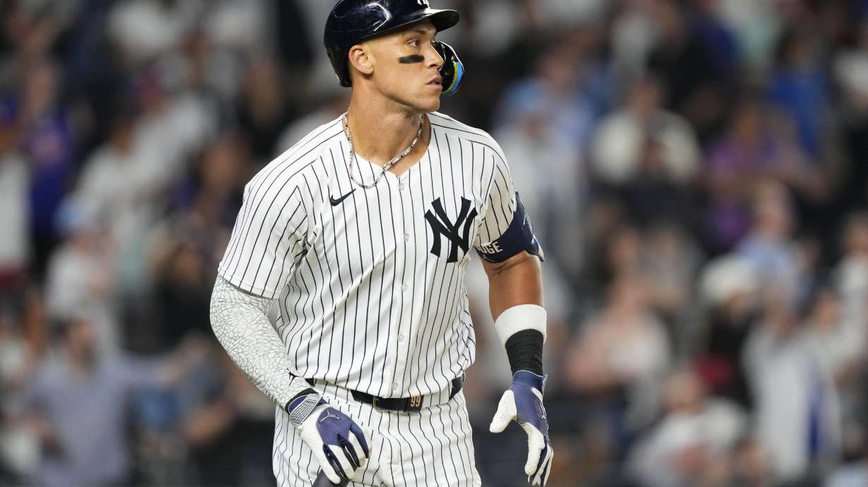 New York Yankees designated hitter Aaron Judge runs after hitting a sacrifice fly during the 10th inning of a baseball game against the Seattle Mariners, Thursday, July 10, 2025, in New York.