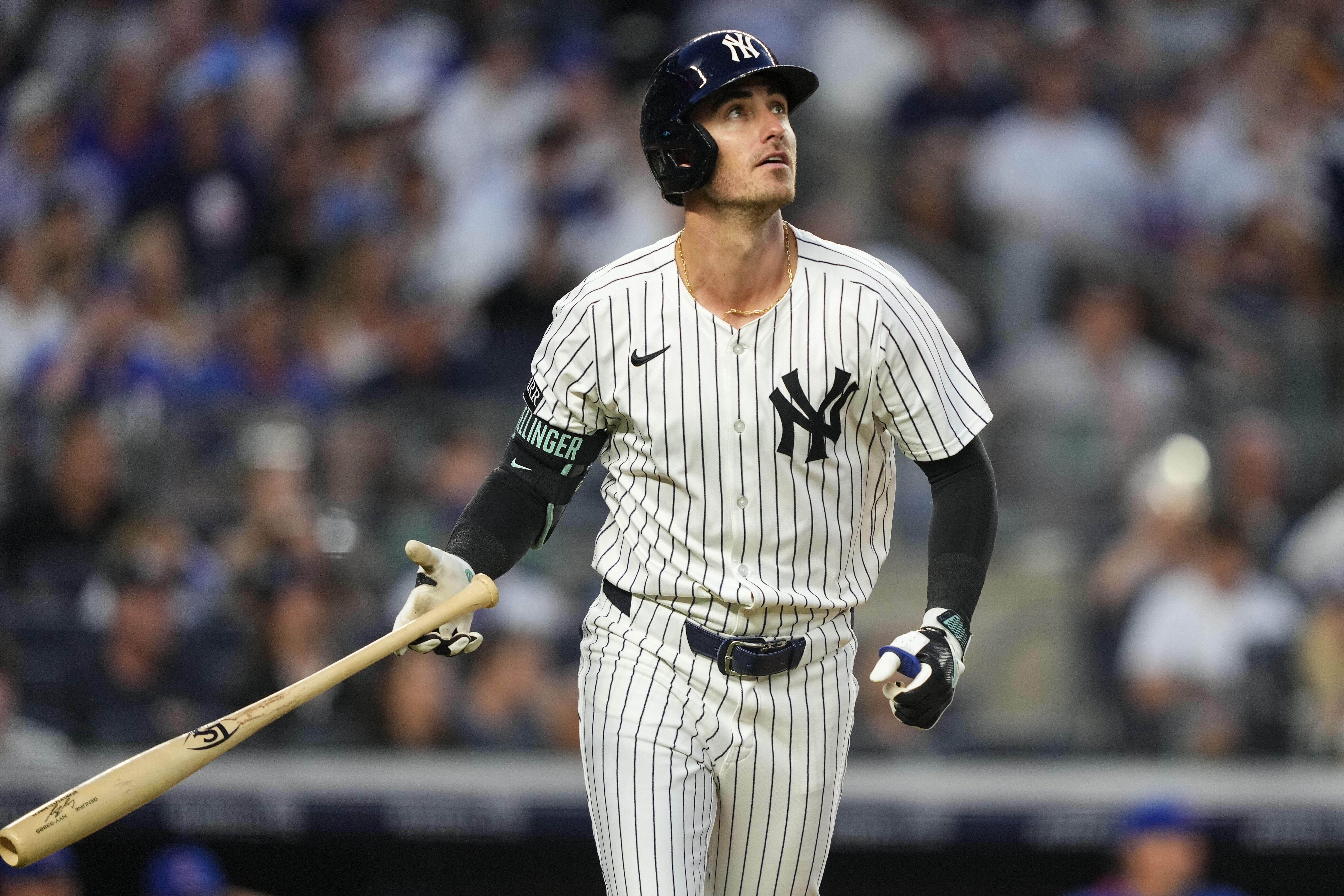 New York Yankees' Cody Bellinger watches his home run during the fifth inning of a baseball game against the Chicago Cubs, Friday, July 11, 2025, in New York.