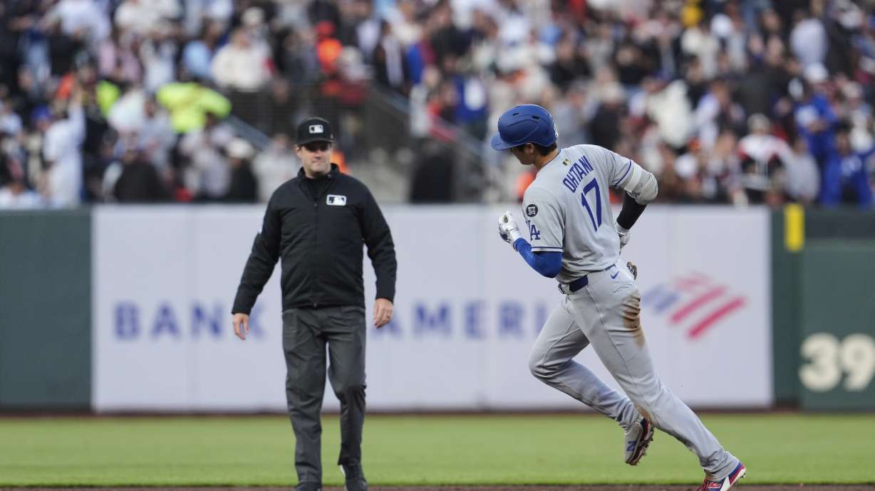 Los Angeles Dodgers' Shohei Ohtani runs the bases after hitting a two-run home run during the third inning of a baseball game against the San Francisco Giants, Friday, July 11, 2025, in San Francisco.