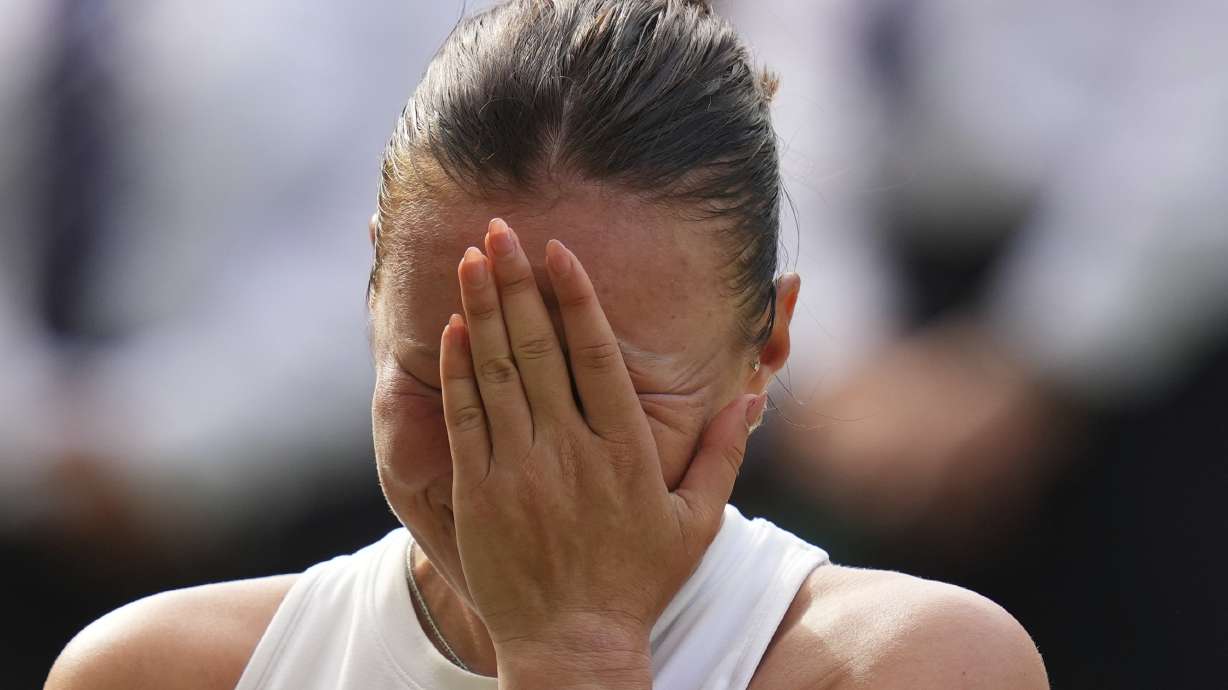 Amanda Anisimova of the U.S. reacts after losing the women's singles final match against Iga Swiatek of Poland at the Wimbledon Tennis Championships in London, Saturday, July 12, 2025.