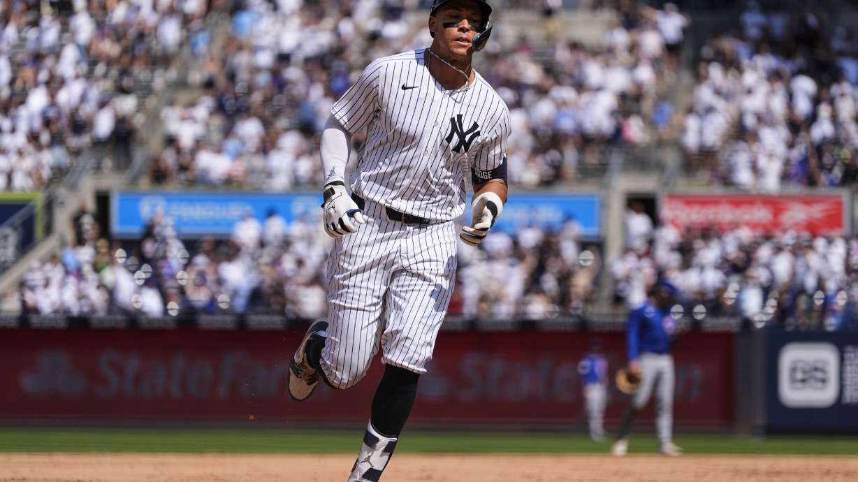 New York Yankees' Aaron Judge (99) runs after hitting a two run home run during the inning of a baseball game against the , Saturday, July 12, 2025, in New York.