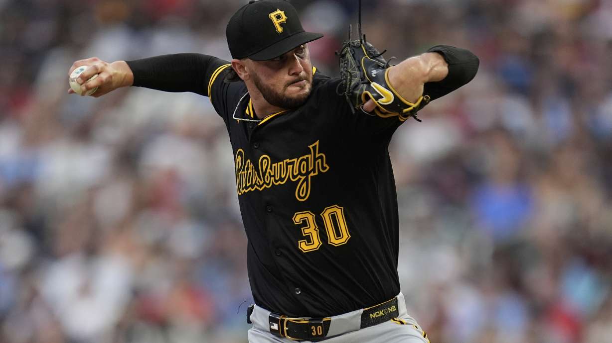 Pittsburgh Pirates starting pitcher Paul Skenes delivers during the third inning of a baseball game against the Minnesota Twins, Friday, July 11, 2025, in Minneapolis.