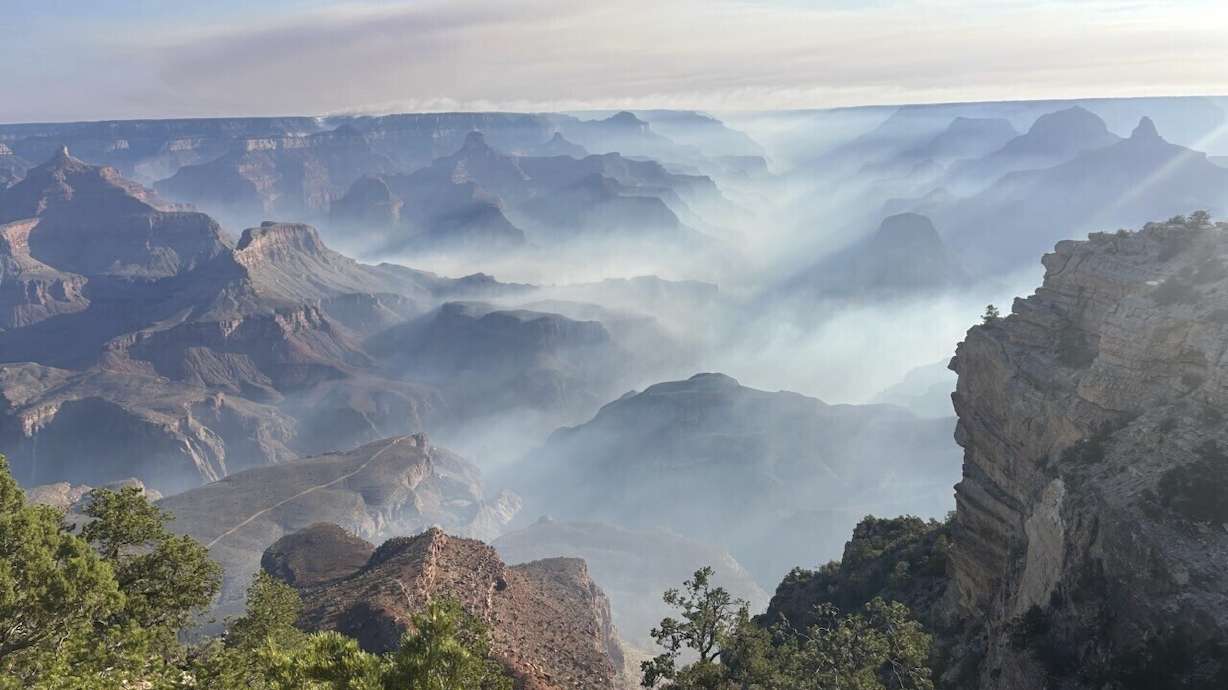 In this photo provided by the National Park Service, smoke from wildfires settles over Grand Canyon National Park in northern Arizona on Friday.