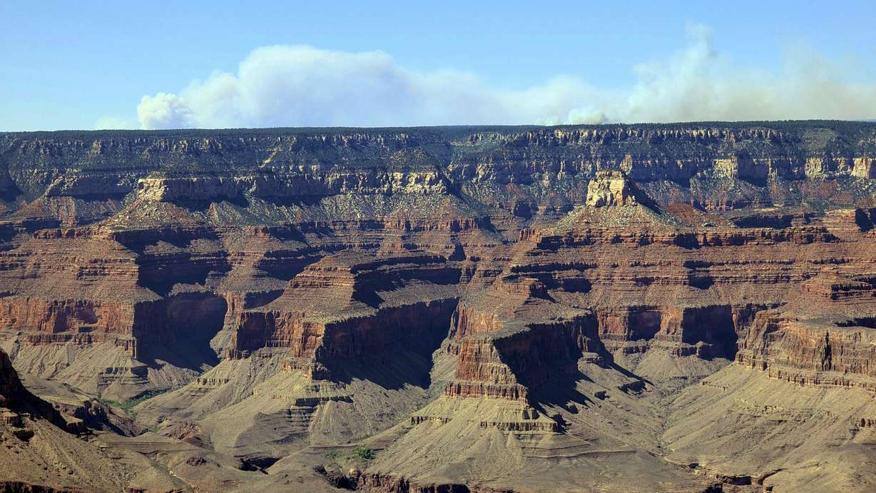 This image provided by Eddie Vallee and taken from the South Rim of Grand Canyon National Park in northern Arizona shows smoke over the park's North Rim on Thursday.