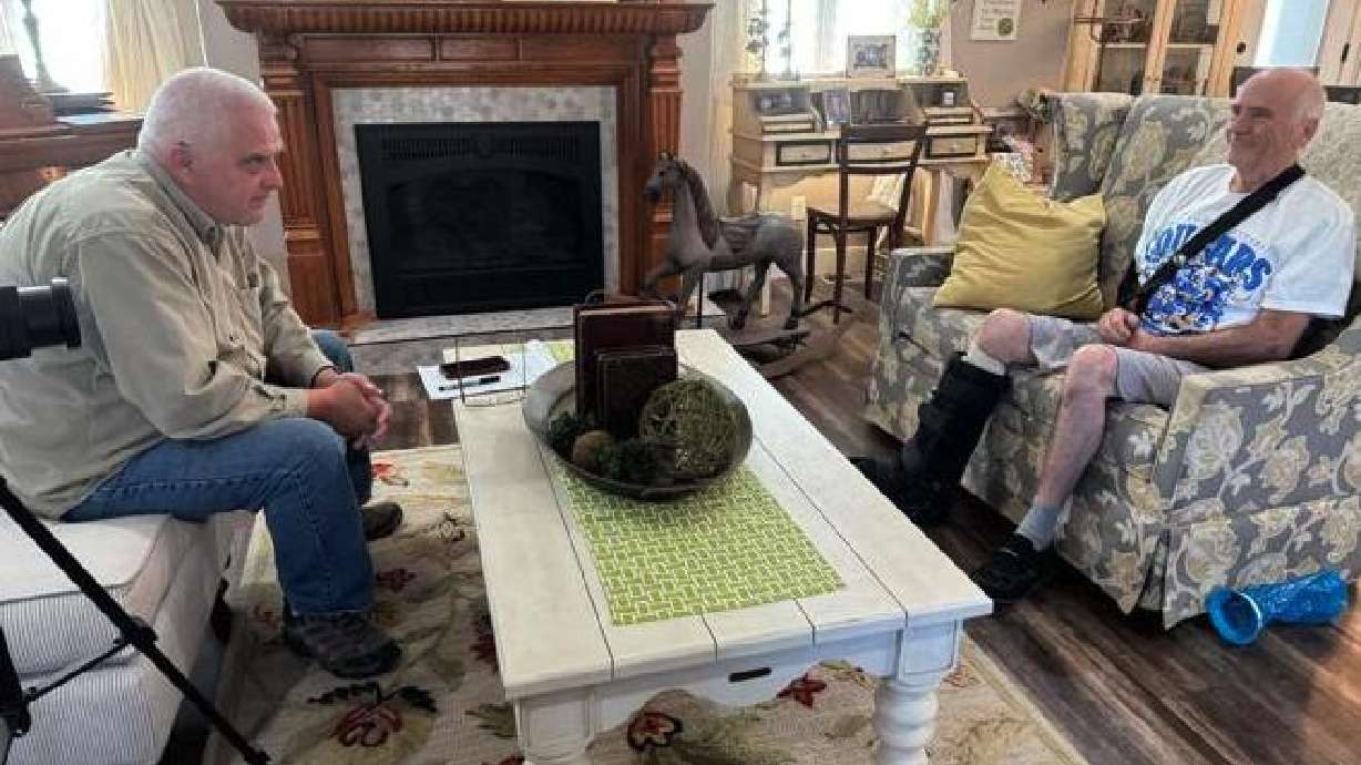 Cedar City News reporter Jeff Richards interviews pilot Dean Englestead at his home, Cedar City, Utah, June 19. Englestead piloted a small jet that crashed after landing in Oregon three months ago and is now sharing his story.