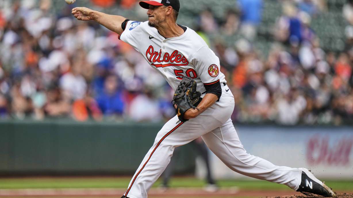 Baltimore Orioles starting pitcher Charlie Morton (50) delivers during the second inning in the first baseball game of a doubleheader against the New York Mets, Thursday, July 10, 2025, in Baltimore.