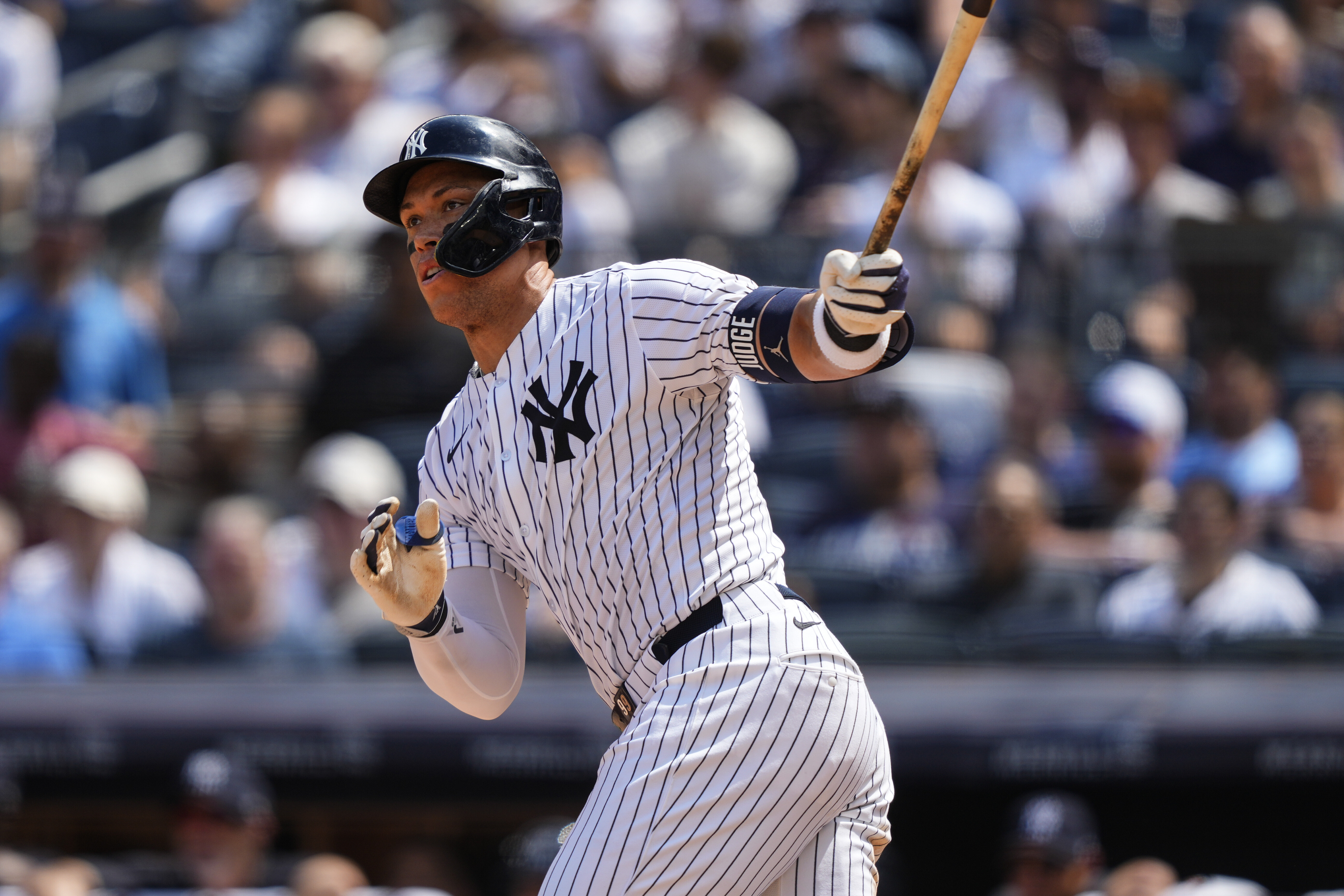 New York Yankees' Aaron Judge (99) hits a double during the seventh inning of a baseball game against the Chicago Cubs, Saturday, July 12, 2025, in New York.