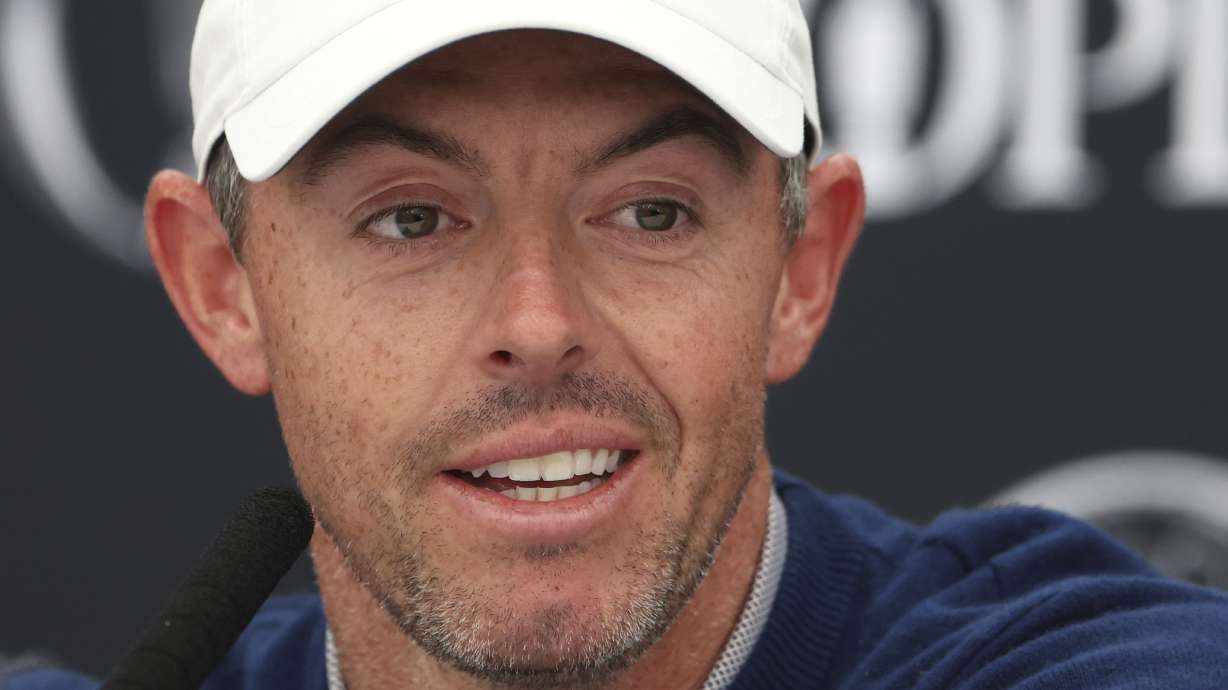Rory McIlroy of Northern Ireland listens to a question from the media at a press conference ahead of the 2025 British Open golf championship at the Royal Portrush Golf Club, Northern Ireland, Monday, July 14, 2025.