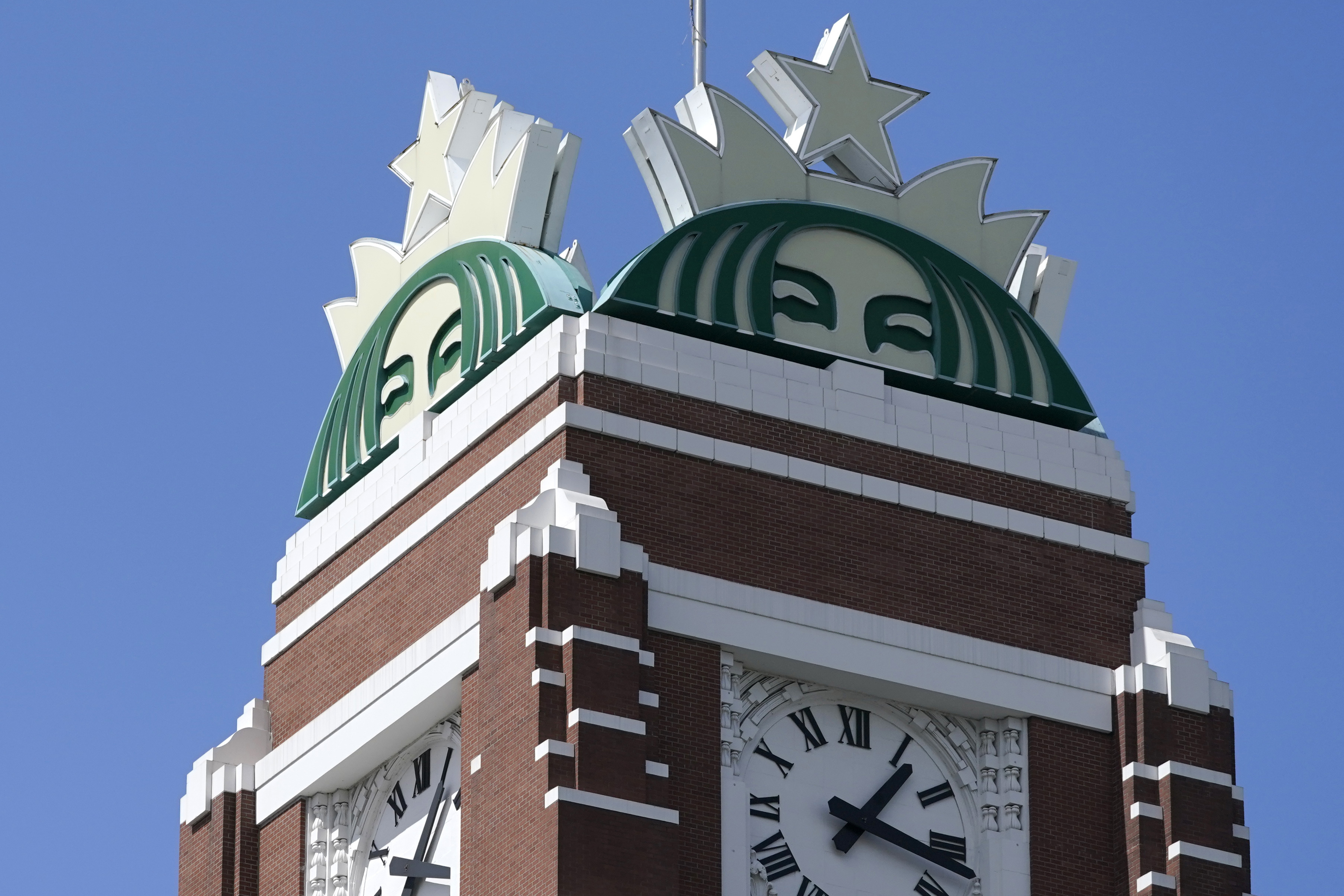 Starbucks is requiring some remote workers to return to its headquarters and increasing the number of days that corporate employees are required to work in an office.