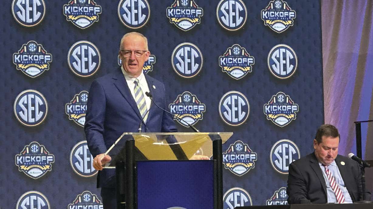 SEC Commissioner Greg Sankey discusses the annual conference highlights with Communications Director Chuck Dunlap sitting at the College Football Hall of Fame in Atlanta, Monday, July 14, 2025.