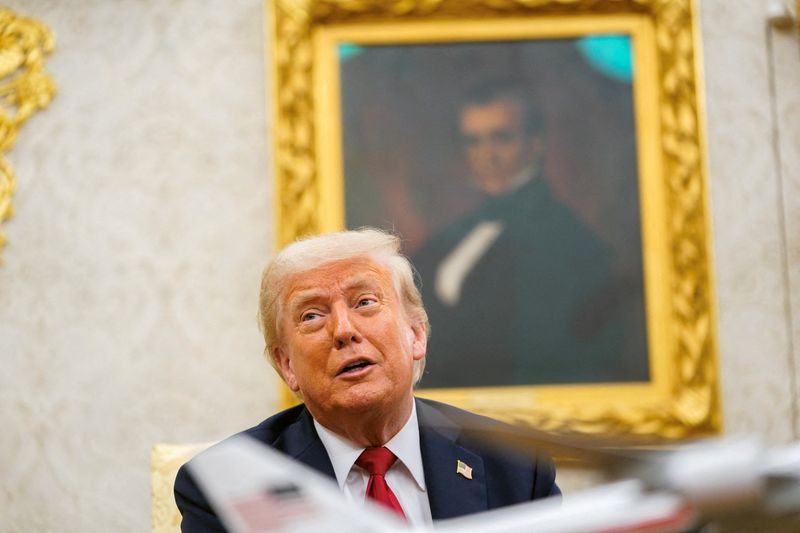 President Donald Trump in the Oval Office in Washington, July 14. A federal judge blocked him from firing Federal Reserve Gov. Lisa Cook on Tuesday.