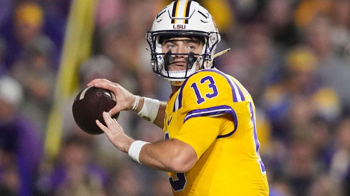 FILE - LSU quarterback Garrett Nussmeier (13) passes in the first half of an NCAA college football game against Vanderbilt in Baton Rouge, La., Saturday, Nov. 23, 2024.